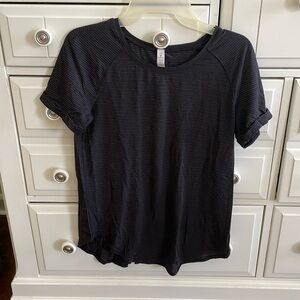 Lululemon short sleeve top, black, size 4. Great condition! Barely worn.